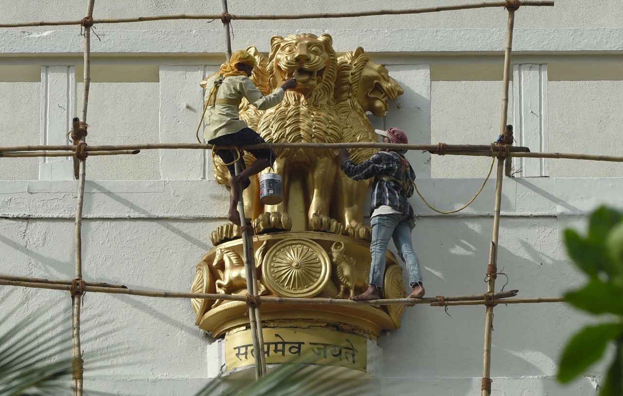 Critics have suggested that other depictions of the national emblem, such as this one in Mumbai, have a more benevolent appearance.