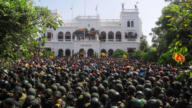 People protest outside the prime minister's office in Colombo, Sri Lanka, on Wednesday, July 13.