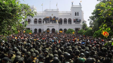 People protest outside the prime minister's office in Colombo, Sri Lanka, on Wednesday, July 13.