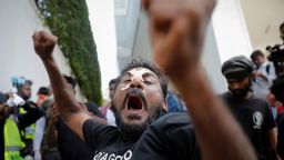 Protestors shout slogans during a protest outside Sri Lanka's Prime Minister Ranil Wickremesinghe's office premises, amid the country's economic crisis, in Colombo, Sri Lanka July 13, 2022. REUTERS/Adnan Abidi