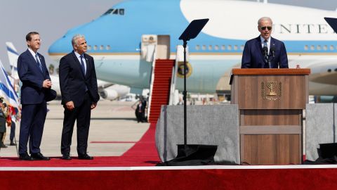 Israeli President Isaac Herzog and Prime Minister Yair Lapid listen as U.S. President Joe Biden delivers remarks during welcoming ceremony at Ben Gurion International Airport in Lod, near Tel Aviv, Israel, July 13, 2022. REUTERS/Amir Cohen