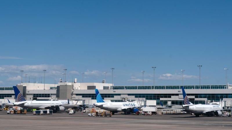 Passengers rushed off flight in Denver after reports of smoke and fire ...