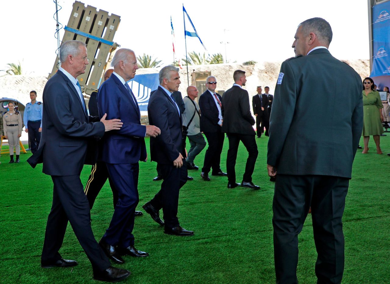 Israeli Defense Minister Benny Gantz, left, joins Biden and Lapid for a briefing on Israel's Iron Dome defense system and the next-generation, laser-enabled Iron Beam system.