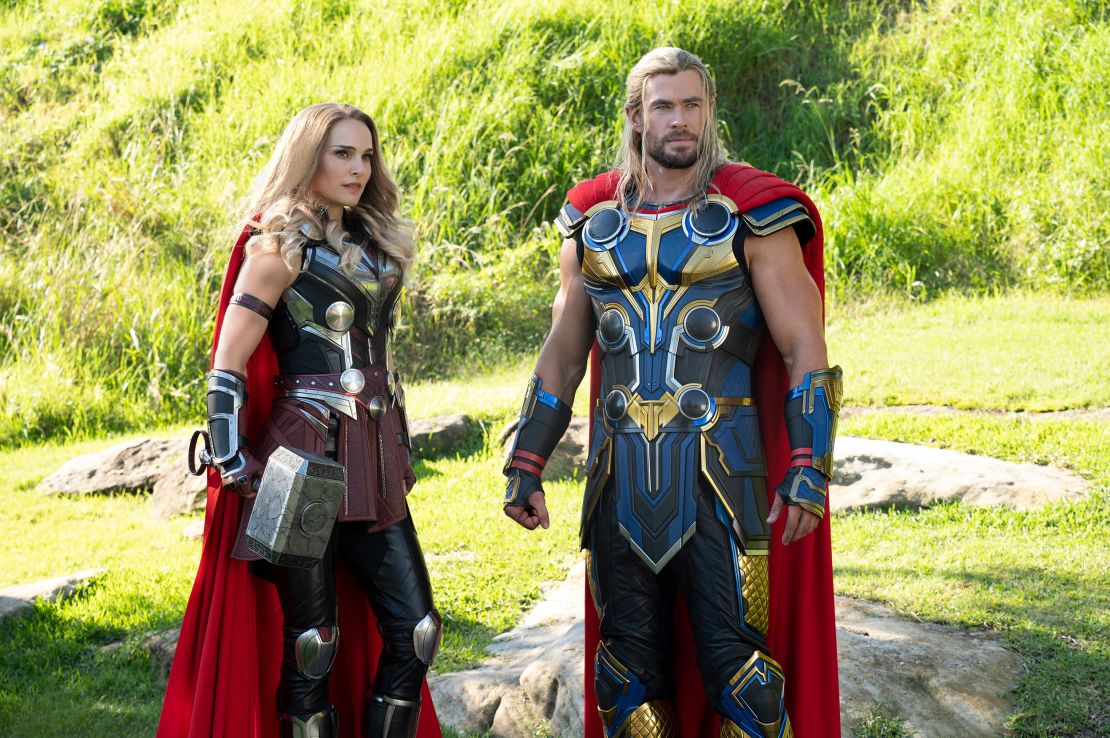 This image released by Marvel Studios shows Natalie Portman, left, and Chris Hemsworth in a scene from "Thor: Love and Thunder."