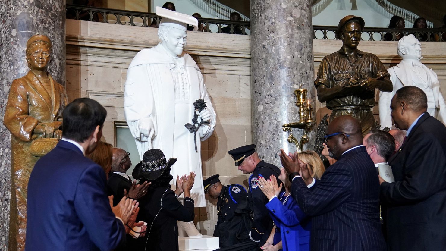 Congressional leadership and family members unveil a statue on Wednesday of Dr Mary McLeod Bethune in Statuary Hall at the U.S. Capitol in Washington.
