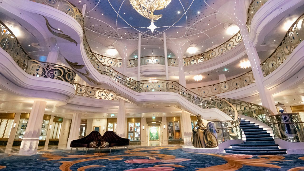 <strong>Grand Hall:</strong> A bronze statue of Cinderella sets the stage in the ship's fairytale-themed atrium.