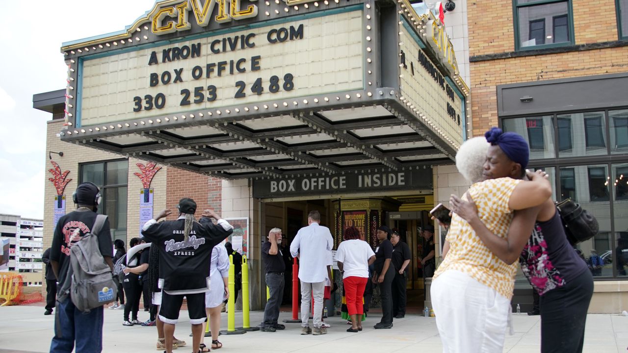 Mourners hug outside the Akron Civic Center after attending a viewing for Jayland Walker in Akron, Ohio, on Wednesday. 