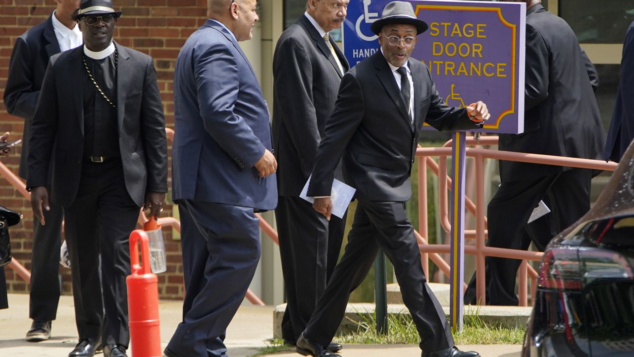 Director Spike Lee, right, leaves the Akron Civic Center in Akron, Ohio, on Wednesday after the funeral service for Jayland Walker.
