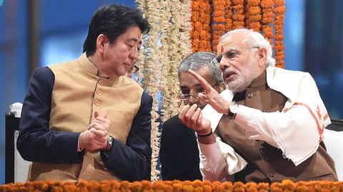 Shinzo Abe meets Indian Prime Minister Narendra Modi on the banks of the River Ganges at Varanasi in December 2015.