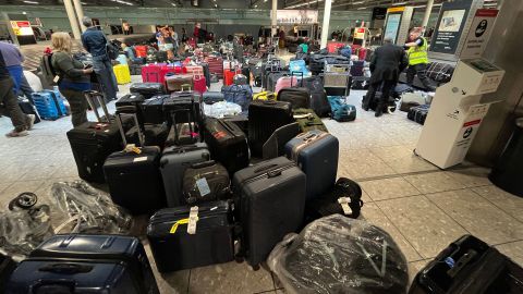 Suitcases are seen uncollected at Heathrow's Terminal Three bagage reclaim on July 8. Delta recently flew a flight from London with no passengers and 1,000 bags to try to solve the backlog of lost luggage affecting its customers.