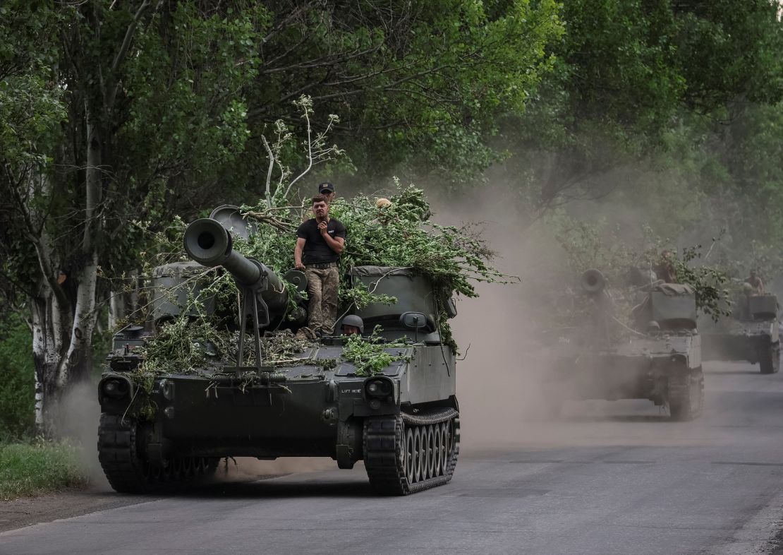 Ukrainian servicemen ride American self-propelled howitzers  in Donetsk.