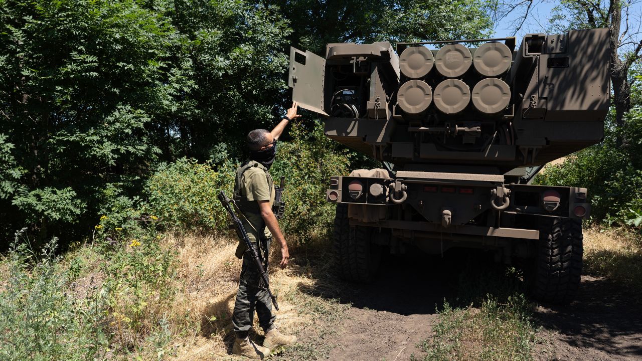 A Ukrainian commander shows off the rockets on a HIMARS vehicle on July 1. 

