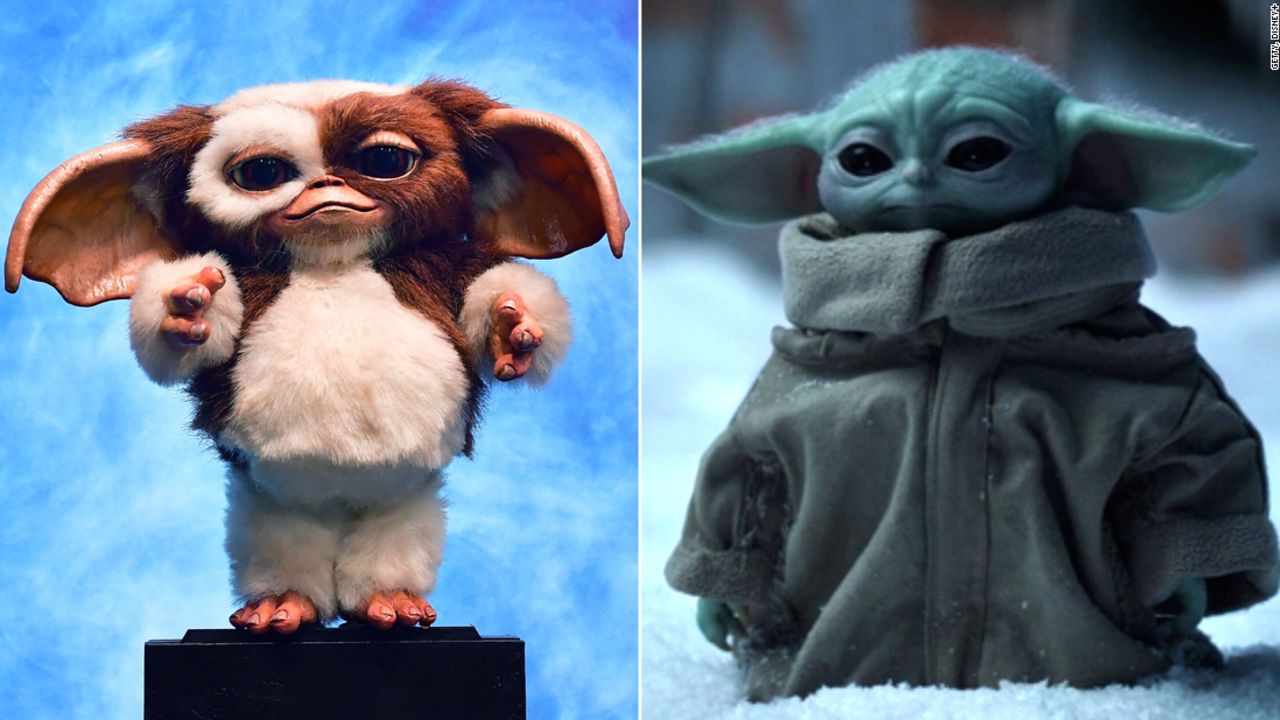 It's Gizmo v. Grogu in the battle of cute baby aliens. One's a Mogwai, the other's a Jedi -- but "Gremlins" director Joe Dante said Gizmo, who came first, is clearly the inspiration for Grogu.