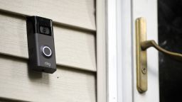 A Ring doorbell camera is seen installed outside a home in July 2019.