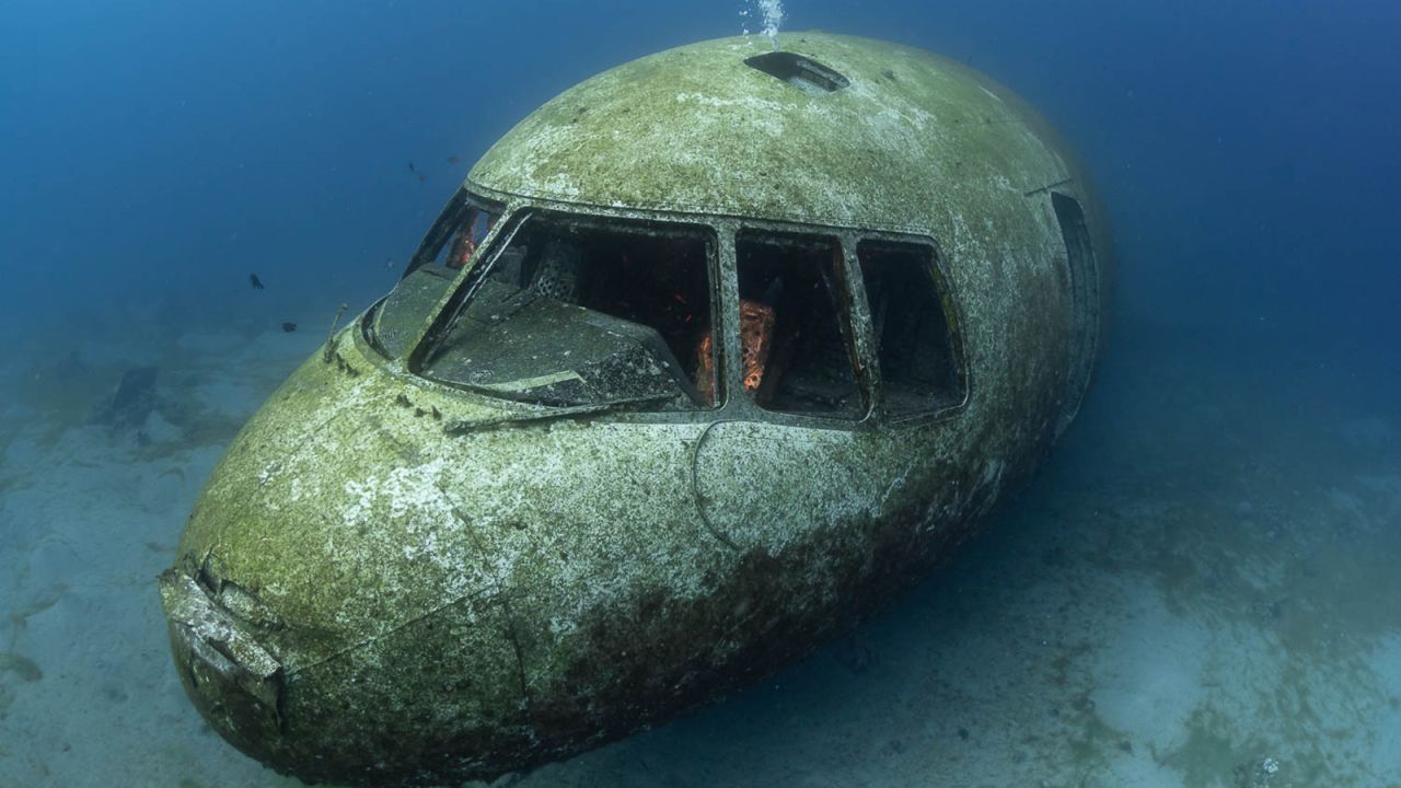 <strong>At an angle: </strong>Hoelzer says the plane lies at a depth of 15 to 28 meters, with the plane's tail at the deepest end. "The cockpit is the shallowest part of the wreck and faces the beach at about 13 meters," he says.