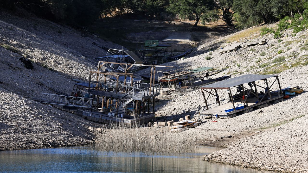 Residential boat docks sit on dry land at Medina Lake outside of San Antonio.