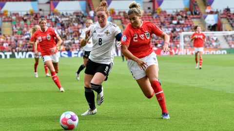 Northern Ireland's captain Marissa Callaghan challenges Marina Georgieva of Austria during Euro 2022.
