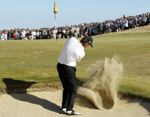 <strong>Thomas Bjorn digs his way out of a hole, 2003 -- </strong>Leading by two strokes with three holes to play <a href=