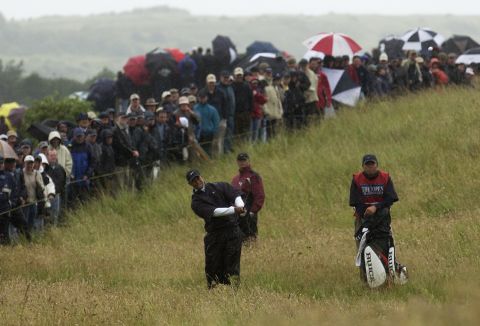 <strong>Tiger Woods swinging (and swinging and swinging) in the rain, 2002 -- </strong>On a fair day at the Open, life is good. But when it gets wet and wild, the major is a different beast. Woods, who at the time was the reigning Masters and US Open winner, was aiming for a Grand Slam when he arrived at Muirfield in 2002. Then came the rain. In the third round, the world's greatest golfer endured one of the most torrid days of his career, carding an <a href=