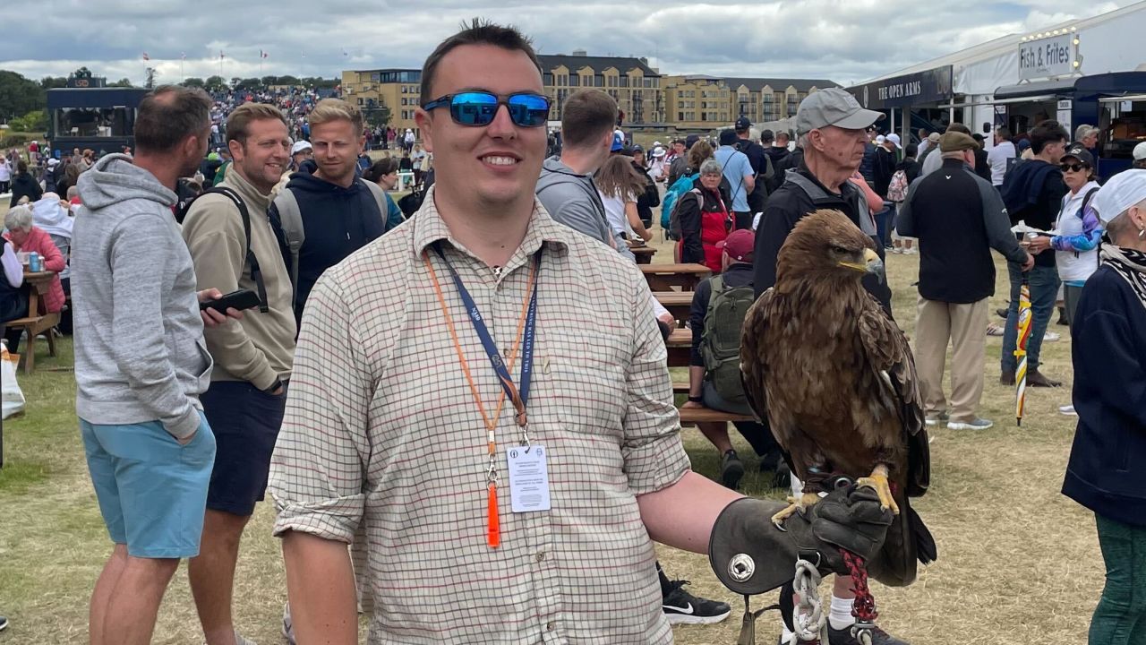 Fearnley the tawny eagle with handler John from Elite Falconry, a company employed by the R&A to scare away problematic seagulls from the Old Course at the 150th Open.