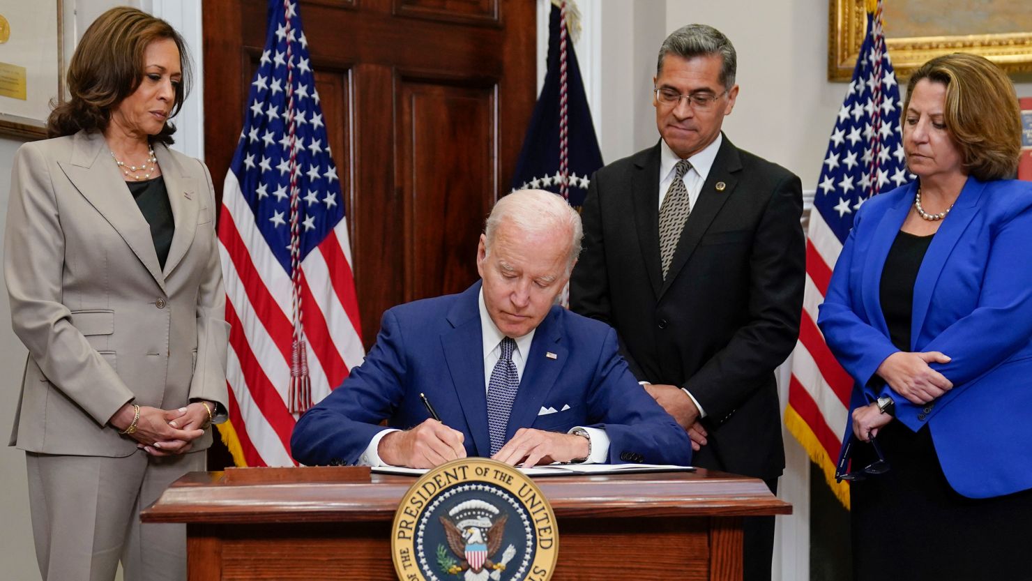 President Joe Biden signs an executive order on abortion access during an event in the Roosevelt Room of the White House, July 8, 2022, in Washington.