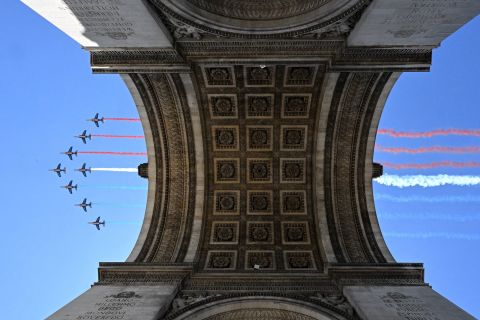 French Air Force jets fly over the Arc de Triomphe in Paris on Monday, July 11, ahead of a Bastille Day parade later in the week.