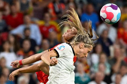 Spain's Patricia Guijarro, top, and Germany's Kathrin Hendrich compete for a header during a Euro 2022 match in London on Tuesday, July 12.