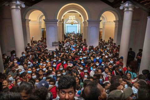 People crowd inside the official residence of Sri Lankan President Gotabaya Rajapaksa on Monday, July 11. Rajapaksa fled the country in the wake of <a href="http://www.cnn.com/2022/07/09/asia/gallery/sri-lanka-crisis-protests/index.html" target="_blank">anti-government protests,</a> and he <a href="https://www.cnn.com/2022/07/14/asia/sri-lanka-gotabaya-rajapksa-thursday-intl-hnk/index.html" target="_blank">tendered his resignation over email.</a>