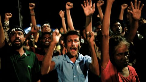 People dance as they celebrate the resignation of Sri Lanka's President Gotabaya Rajapaksa at a protest site, amid the country's economic crisis, in Colombo, on July 14.
