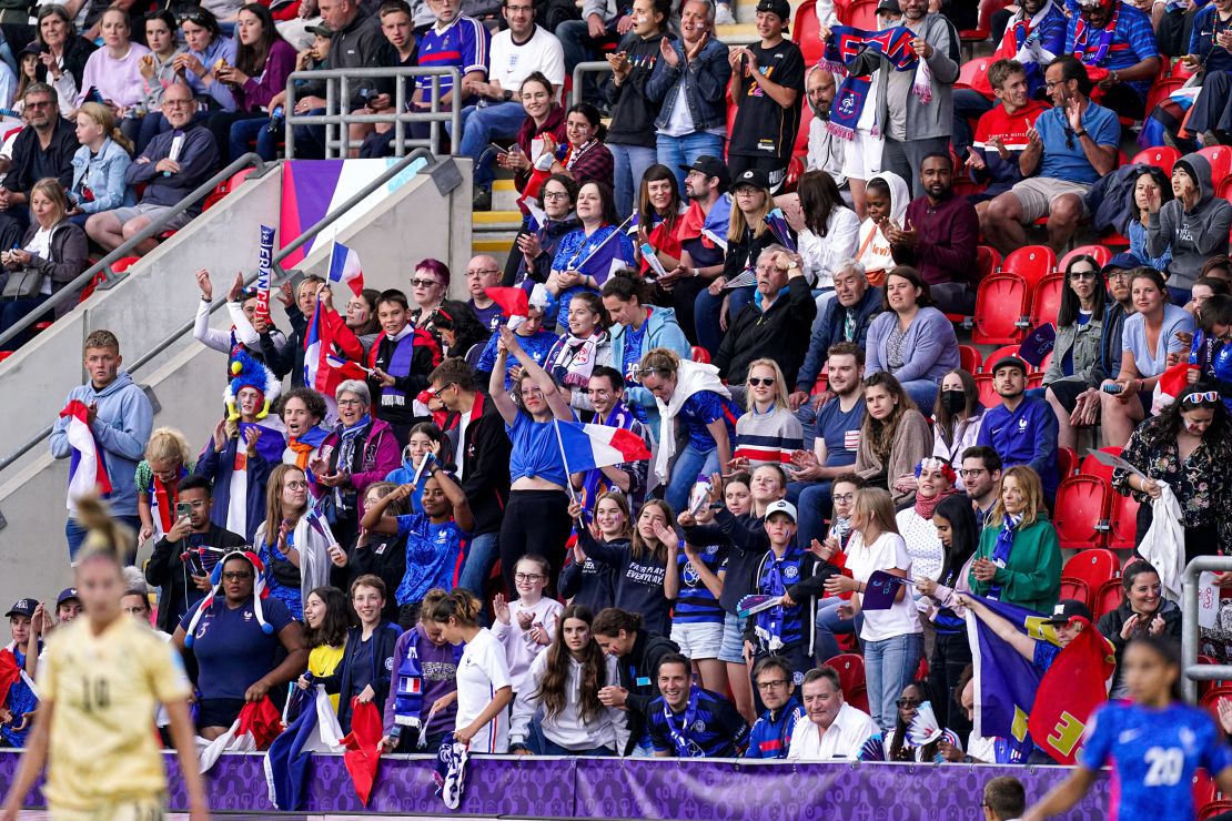 Supporters of France celebrate after Les Bleues scores against Belgium.