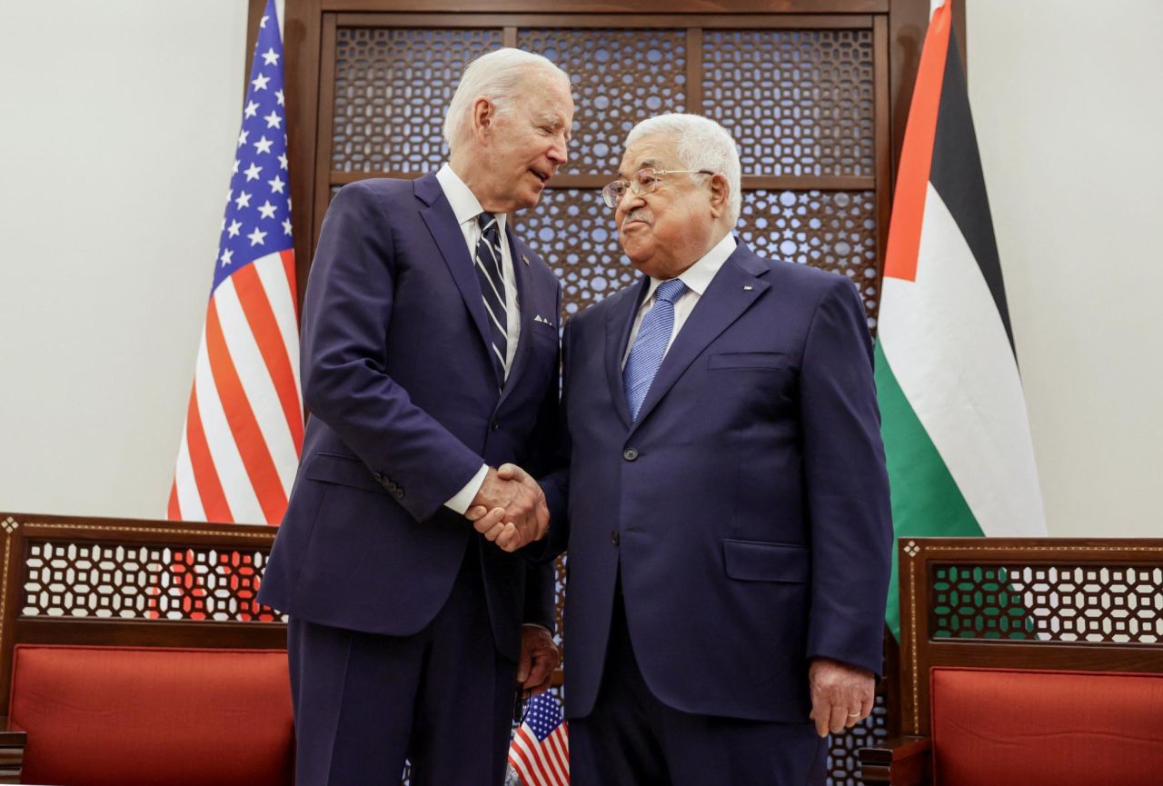 Biden and Abbas shake hands on Friday. The meeting with Abbas came as Biden continues to advocate for a two-state solution to the Israeli-Palestinian conflict. Following his meeting with Abbas, Biden acknowledged such an agreement "seems so far away" and that "the ground is not ripe at this moment to restart negotiations." However, he also suggested that better relations between Israel and Arab nations could lead to momentum to a deal between Israelis and Palestinians.