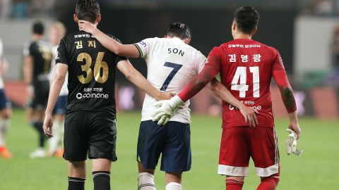 Son (M), Kim Ji-Soo (L) and Kim Young-Kwang (R) of Team K League during the friendly between Tottenham and Team K League.
