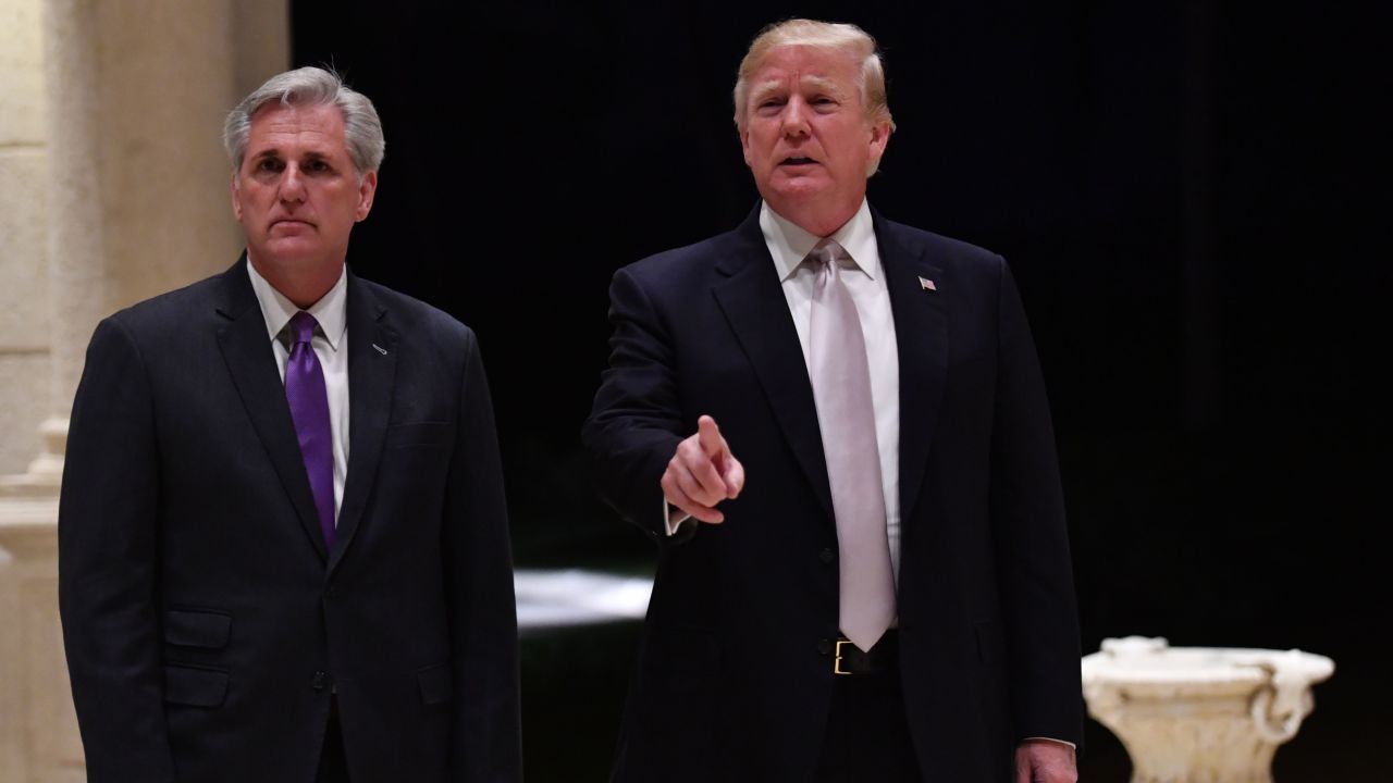 Then-President Donald Trump speaks beside GOP Rep. Kevin McCarthy at Trump International Golf Club in West Palm Beach in June 2018.