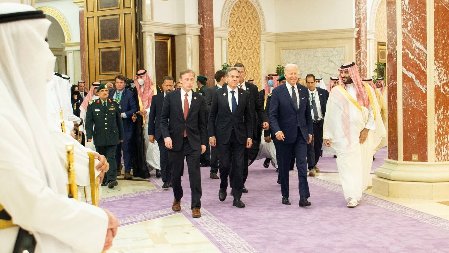 Biden is joined by US Secretary of State Antony Blinken as the Saudi Crown Prince receives them at the palace on Friday.