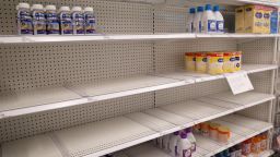 Similac and Enfamil products are seen on largely empty shelves in the baby formula section of a Target store, amid continuing nationwide shortages in infant and toddler formula, in San Diego, California, U.S., May 25, 2022.  REUTERS/Bing Guan/File Photo