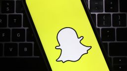 SAN ANSELMO, CALIFORNIA - FEBRUARY 03: In this photo illustration, the Snapchat logo is displayed on a cell phone screen on February 03, 2022 in San Anselmo, California. Shares of Snapchat surged in after hours trading after the company reported a better-than-expected fourth quarter earnings. 