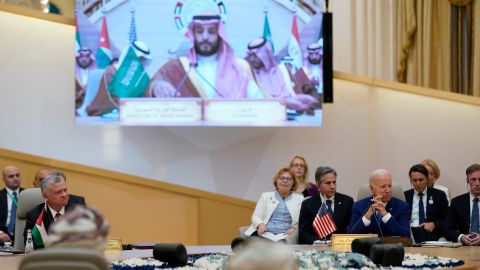 President Joe Biden listens to Saudi Crown Prince Mohammed bin Salman, on the screen, during the Gulf Cooperation Council Saturday, July 16, 2022, in Jeddah, Saudi Arabia. 