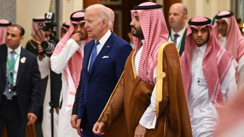 President Joe Biden (L) and Saudi Arabia's Crown Prince Mohammed bin Salman (R) arrive for the family photo during the Jeddah Security and Development Summit (GCC+3) at a hotel in Saudi Arabia's Red Sea coastal city of Jeddah on July 16, 2022.