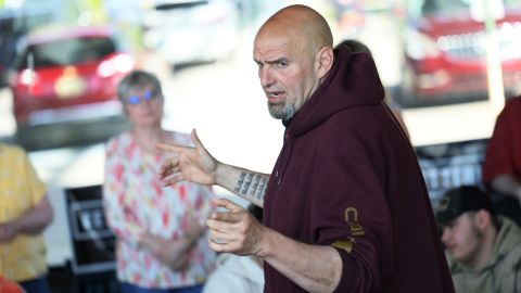 Democratic Senate candidate John Fetterman, here campaigning in Lemont Furnace, Pennsylvania, on May 10, 2022, raised nearly $11 million in the second quarter. 