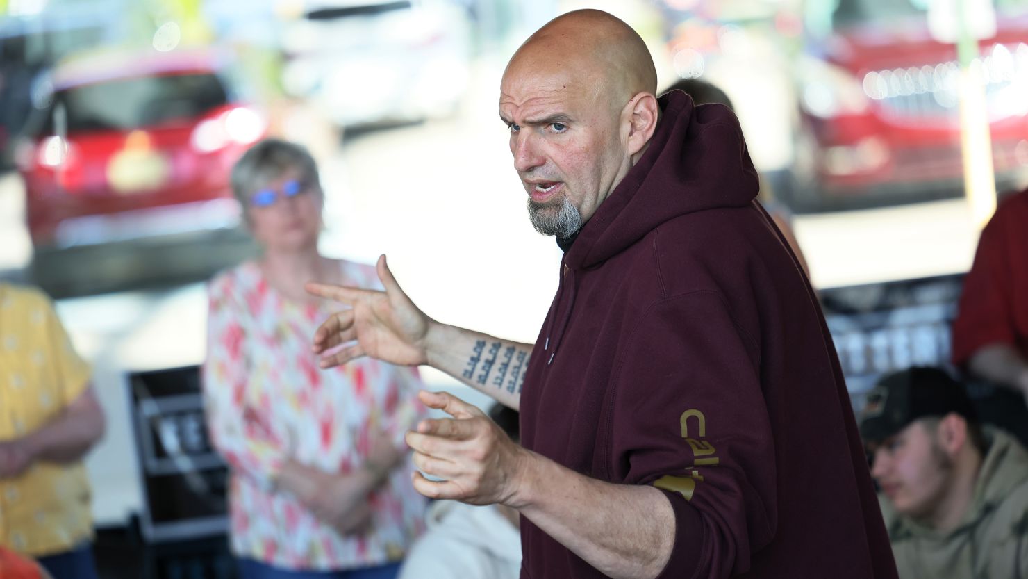 Democratic Senate candidate John Fetterman, here campaigning in Lemont Furnace, Pennsylvania, on May 10, 2022, raised nearly $11 million in the second quarter. 