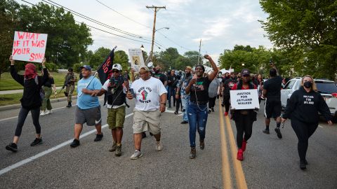 Demonstrators march after a vigil in honor of Jayland Walker on July 8, 2022, in Akron, Ohio.