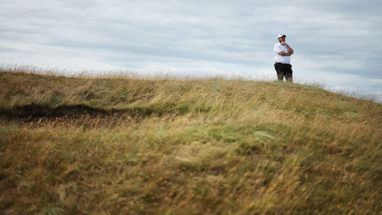 Lowry of Ireland looks down on the 13th hole.