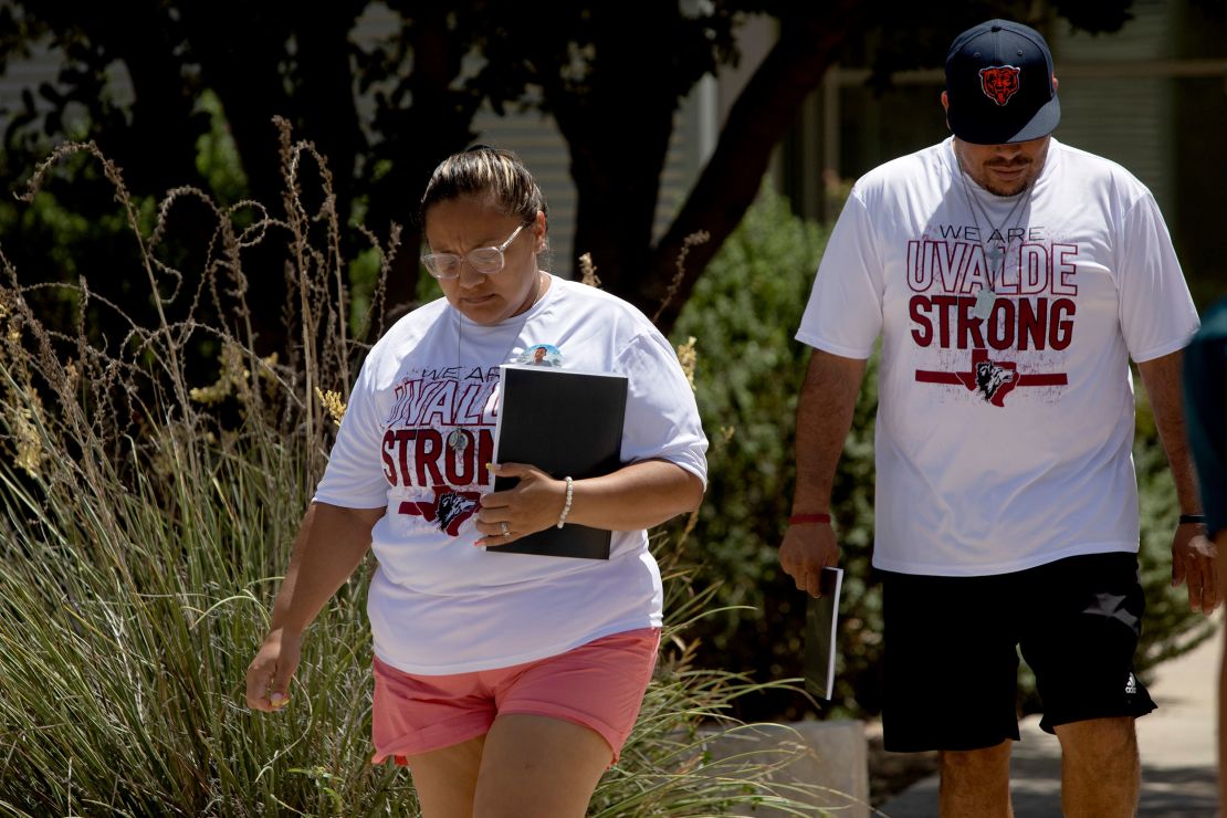 Family members of victims leave the Sgt. Willie de Leon Civic Center after picking up a copy of the Texas House investigative committee's preliminary report on the Robb Elementary School shooting in Uvalde, Texas on Sunday, July 17, 2022. 