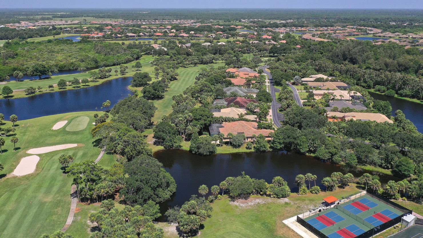 The woman fell into a pond at the Boca Royale Golf and Country Club.