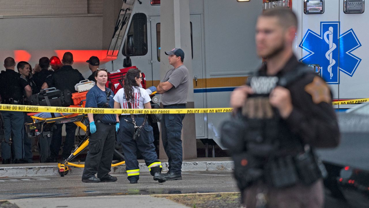 Emergency personnel gather after a deadly shooting Sunday, July 17, 2022, at the Greenwood Park Mall, in Greenwood, Ind. (Kelly Wilkinson/The Indianapolis Star via AP)