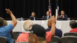 Rep. Dustin Burrows, R-Lubbock, center, speaks with committee members Texas State Rep. Joe Moody, D-El Paso, right, and former Texas Supreme Court Justice Eva Guzman during a press conference after the viewing of the video from inside Robb Elementary School and a briefing on the Texas House Investigative Committee's preliminary report on the shooting, at the Ssgt. Willie de Leon Civic Center in Uvalde, Texas on Sunday, July 17, 2022. 