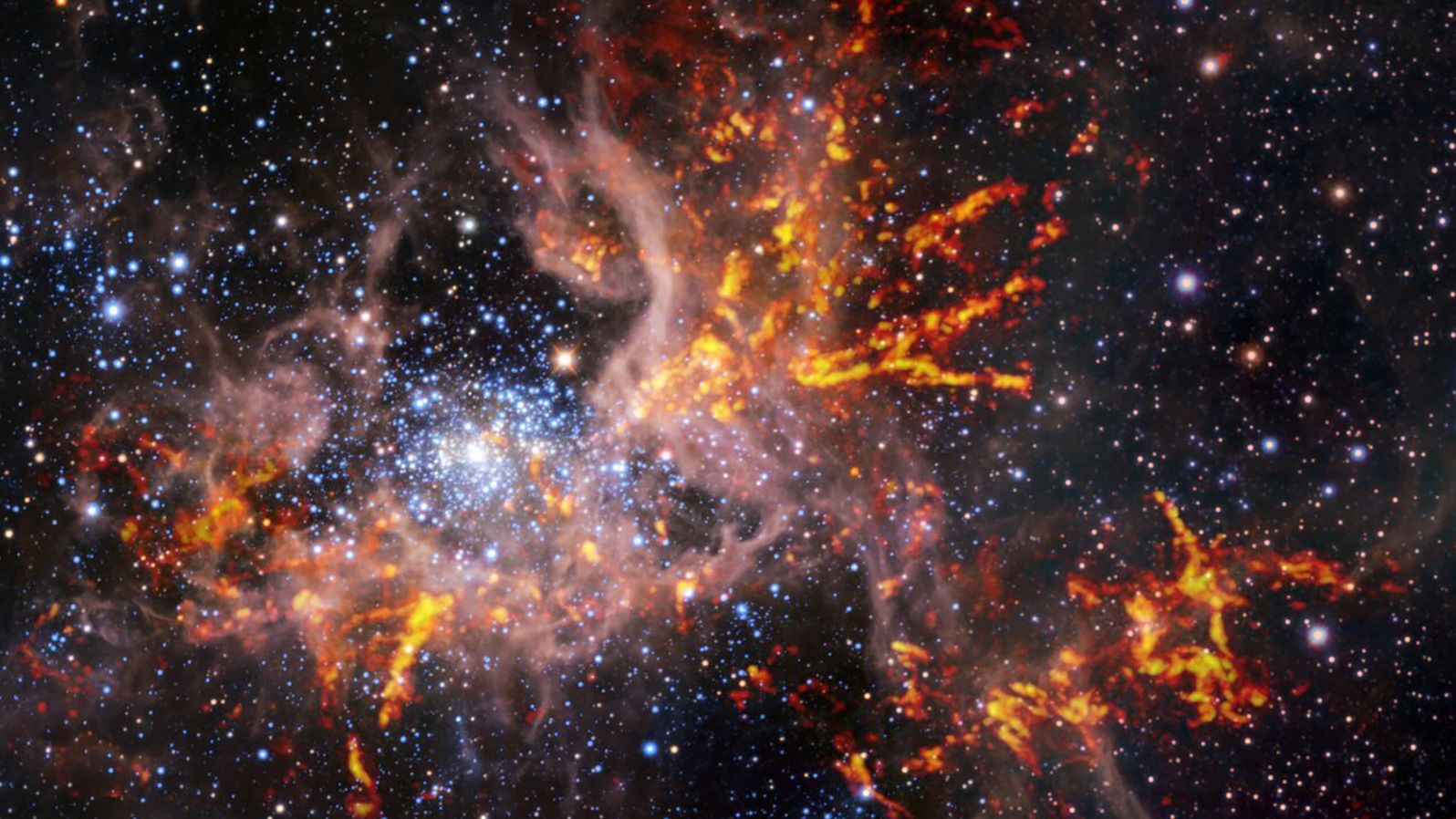 This composite image shows the Tarantula Nebula. The unique weblike structure of the gas clouds led astronomers to the nebula's spidery nickname.