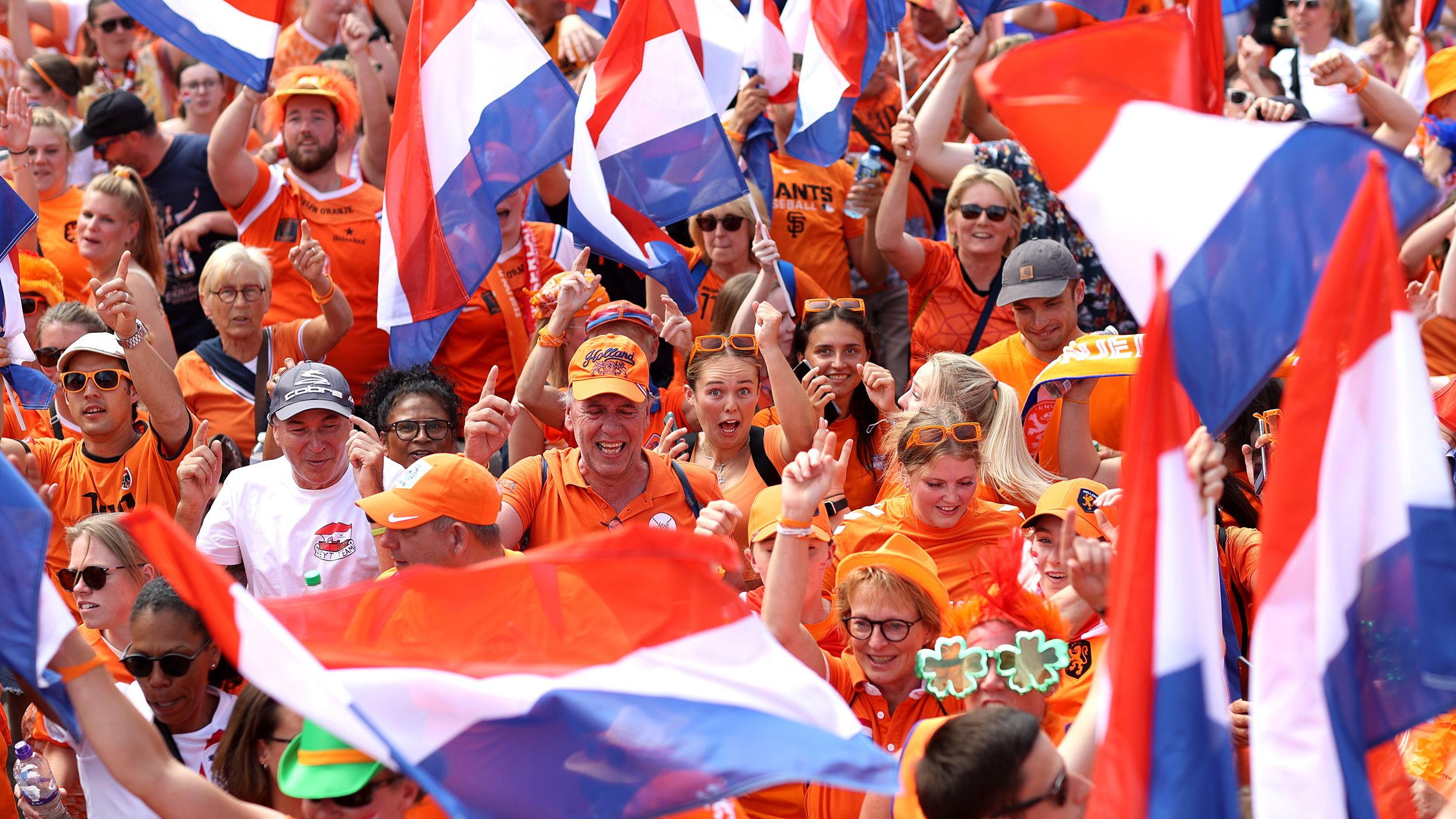 Netherlands fans show their support on the way to the stadium  for the team's game against Switzerland.