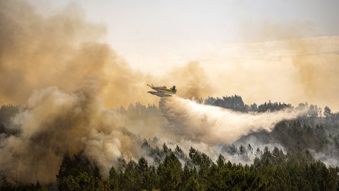 An airplane takes part in firefighting operations in Portugal on July 14.