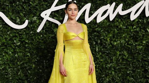 Emilia Clarke poses on the red carpet upon arrival at The Fashion Awards 2019 in London on December 2, 2019. 